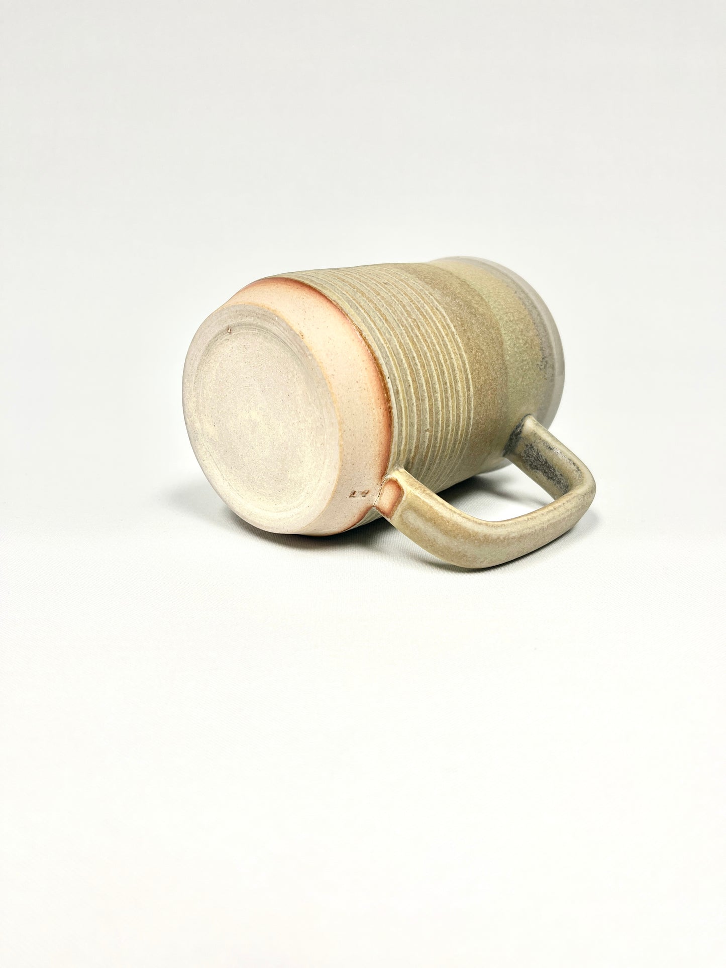 Sandy green Ridge Mug by Lynne Mulvihill