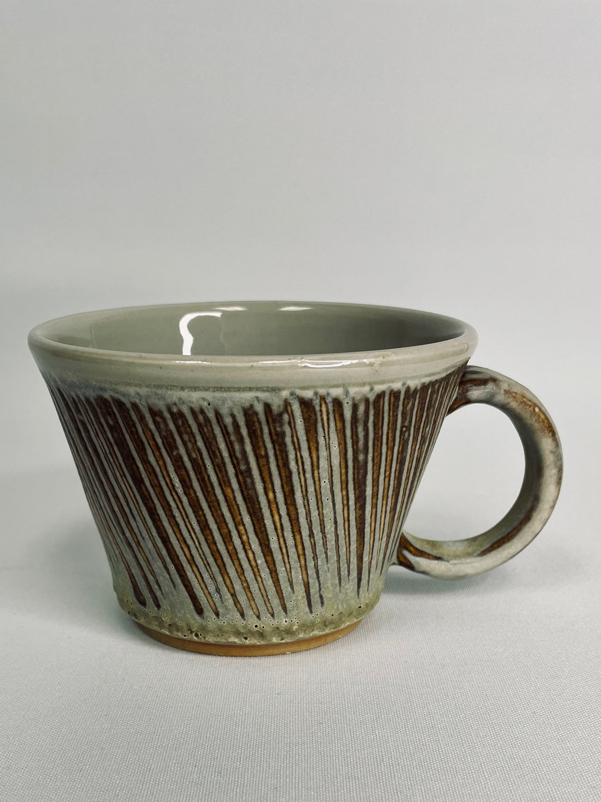 Grey/Brown coffee mug by Lynne Mulvihill
