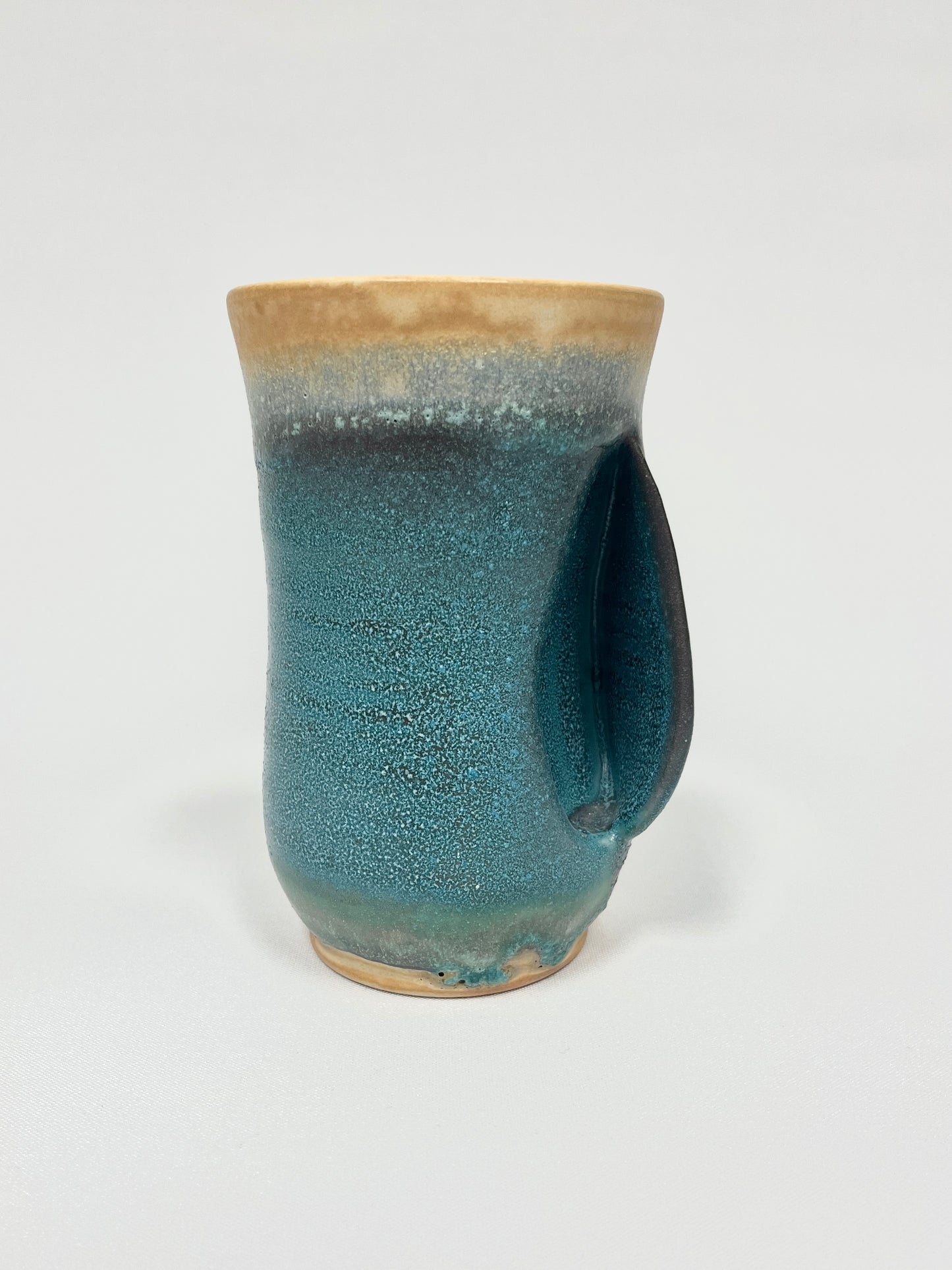 Turquoise Handwarmer Mug by Britta Spiring