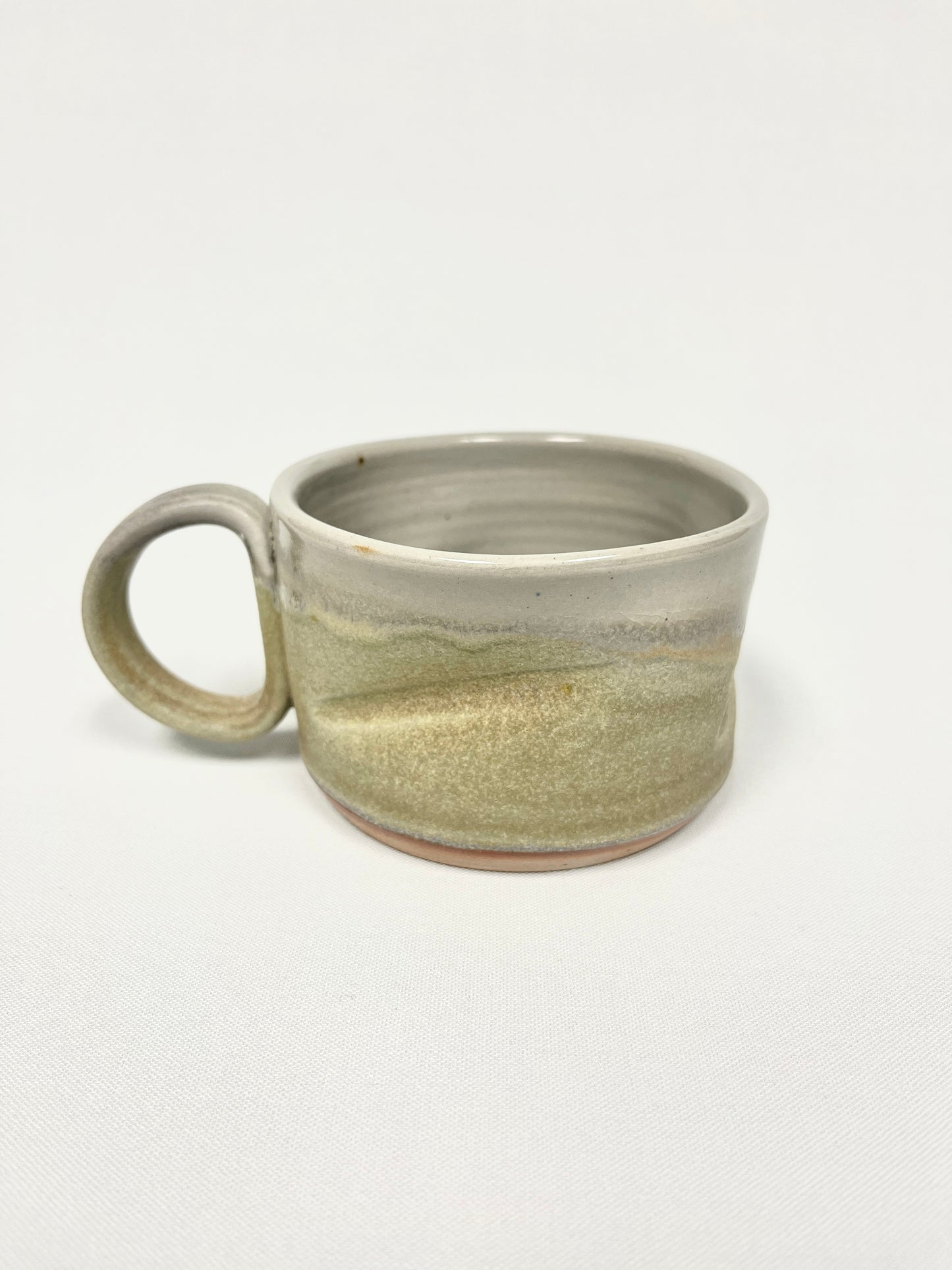 Sandy green Slash Mug by Lynne Mulvhill